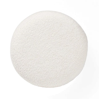 Overhead view of round ivory boucle ottoman