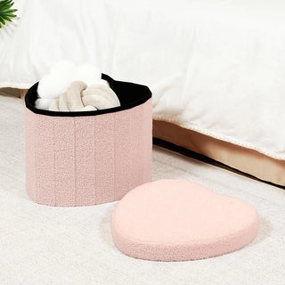 Pink heart ottoman with open lid showing interior storage space