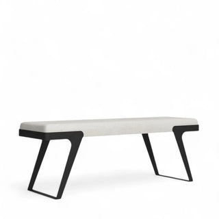 Side view of white boucle bench showcasing angular black metal legs and plush upholstered seat