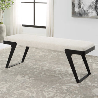 White boucle bench positioned in modern bedroom setting with neutral decor