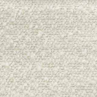 Close-up of ivory tweed fabric featuring light textured surface with subtle flecks.