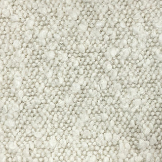 Close-up of pearl tweed fabric showing light, luminous weave with subtle texture.