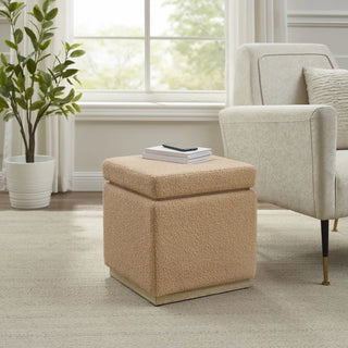 Blush sherpa boucle storage ottoman beside accent chair in cozy reading nook