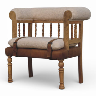 Wooden bench with upholstered seat and backrest on a white background