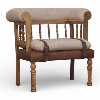 Wooden bench with upholstered seat and backrest on a white background