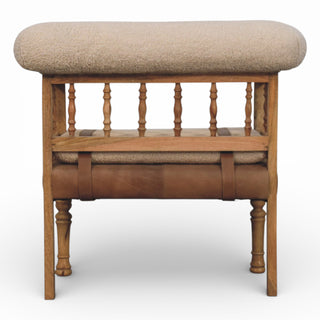 Wooden bench with beige cushioned top and leather seat on a white background