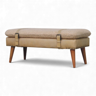 Beige ottoman with wooden legs on a white background