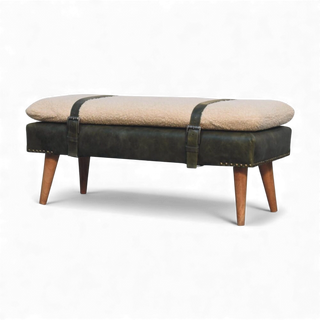 Bench with beige cushion and green leather straps on a white background