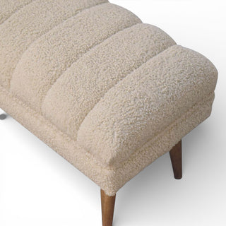 Beige textured bench with wooden legs on a white background