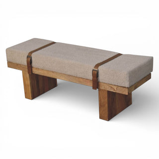 Bench with wooden frame and upholstered seat on a white background