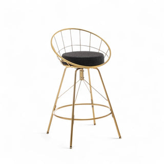 Boucle counter stool with round black sherpa upholstered seat and circular gold metal frame