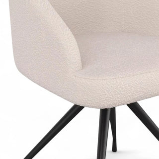 Close-up image highlighting the boucle texture and quality stitching on the seat and backrest.