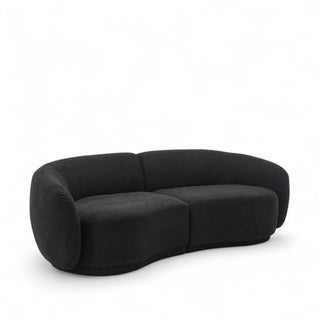 Black version of the boucle loveseat showing alternative color option