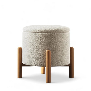 Light gray boucle storage ottoman with front view showing its elegance. 
