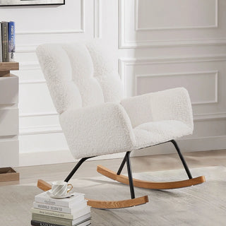 Boucle rocking chair placed in a nursery setting, styled with neutral decor and a side table.