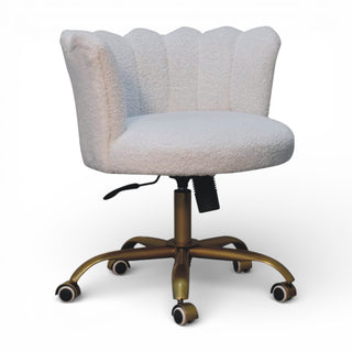 White office chair with scalloped backrest on a white background