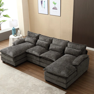 Gray boucle sectional in minimalist living room with decorative accessories