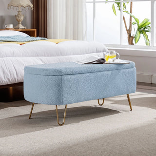 Blue boucle bench with storage in modern living room setting