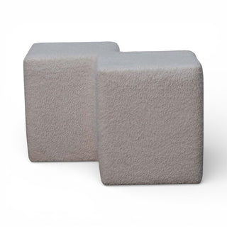 Chair with light gray cushioned seat and backrest on a white background