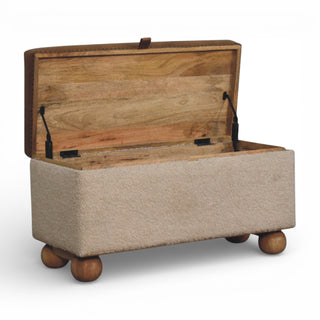 Wooden storage chest with beige fabric interior on a white background