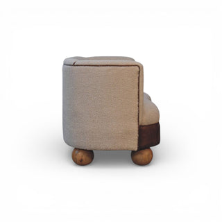 Beige ottoman with wooden legs on a white background