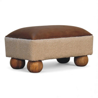 Rectangular ottoman with brown leather top and beige fabric sides on a white background