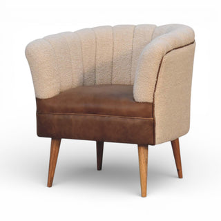 Chair with brown leather seat and beige upholstered backrest on a white background