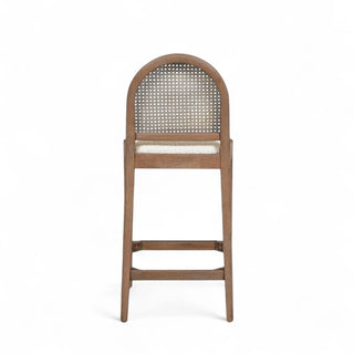 Close-up view of natural cane webbing on counter stool backrest showing handcrafted texture and pattern