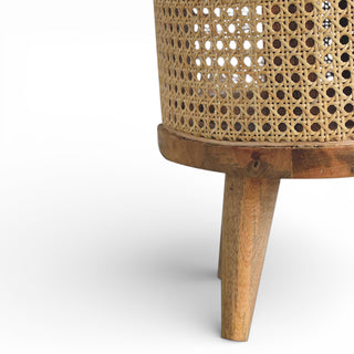 Wicker basket with wooden base on a white background