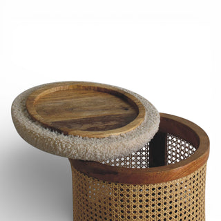 Wooden cat tree with round platform and textured base on a white background