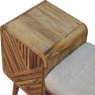 Wooden stool with a textured surface on a white background
