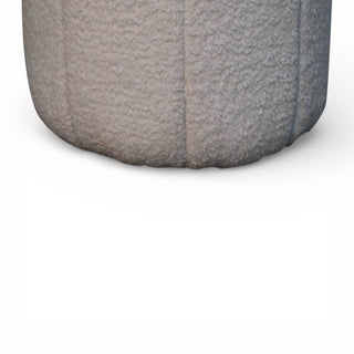 Close-up of a textured gray cylindrical object on a white background