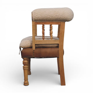 Wooden stool with fabric and leather seats on a white background