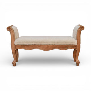 Wooden bench with upholstered seat on a white background