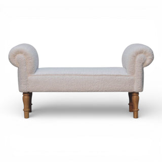 Decorative bench with curved ends and wooden legs on a white background