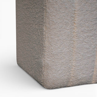 Close-up of a textured gray fabric on a white background