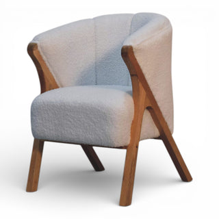 Chair with wooden frame and multicolored fabric on a white background