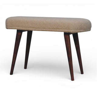 Round ottoman with brown cushioned top and dark wooden legs on a white background