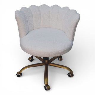 Decorative chair with scalloped backrest on a white background