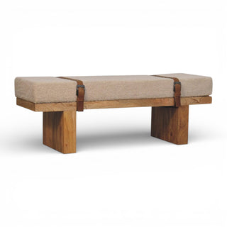 Wooden bench with beige cushion on a white background