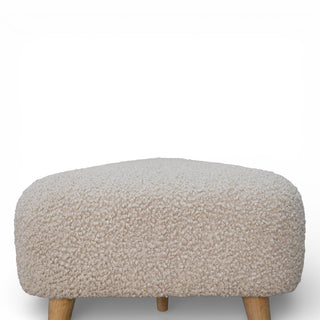 Beige textured ottoman on a white background