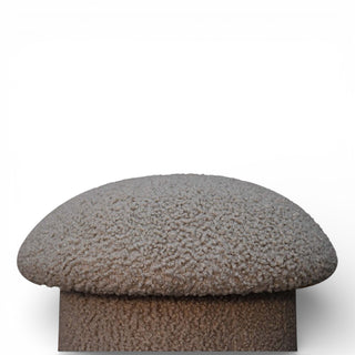 Textured brown ottoman on a white background