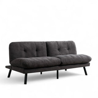Charcoal boucle futon in upright sofa position showing clean lines and textured fabric upholstery