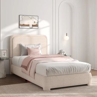 Cream boucle twin bed frame with rounded headboard in children's bedroom with playful art