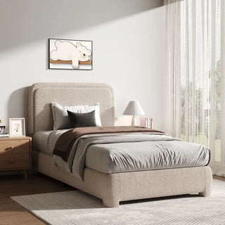 Dark grey boucle bed frame variant with decorative pillows