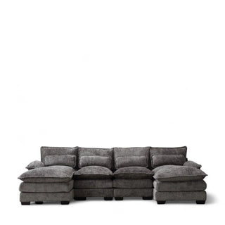 Gray boucle U-shaped sectional sofa with textured fabric in contemporary living space