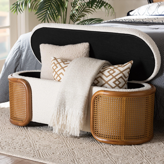 Open storage bench displaying interior compartment with folded blankets and pillows inside