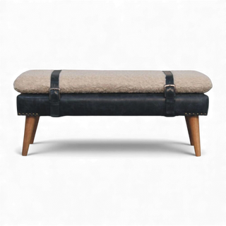 Bench with quilted top and blue leather sides on a white background