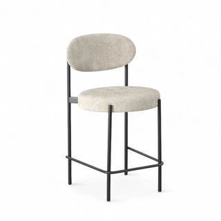 Luna Counter Stool in cream boucle fabric with curved back and black metal frame, front view