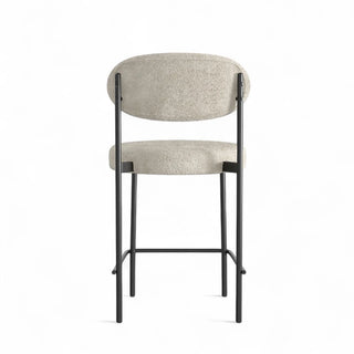 Rear perspective of Luna Boucle Counter Stool showing structural frame design and textured upholstery